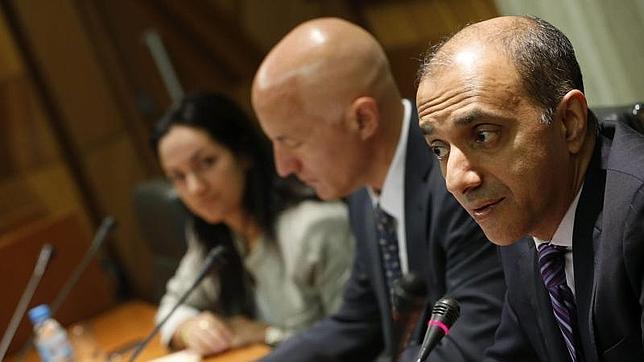 Los representantes de la troika durante una de sus visitas a España
