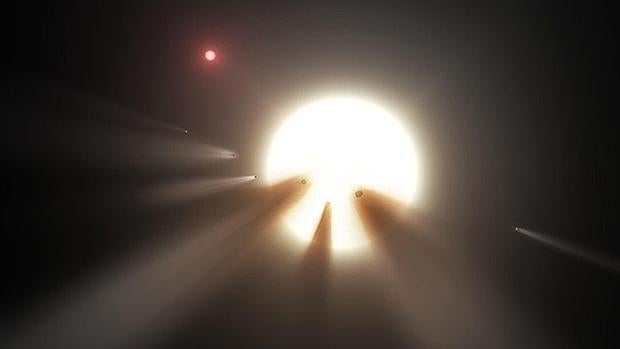 Un grupo de cometas frente a una estrella