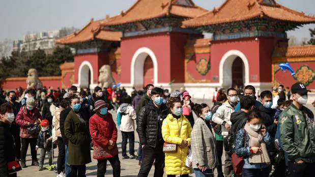 Ciudadanos fotografiados este lunes en la provincia de Liaoning, China