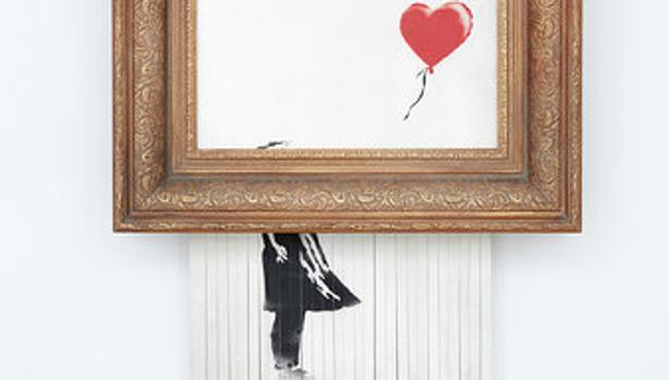 La obra de Banksy triturada en una subasta