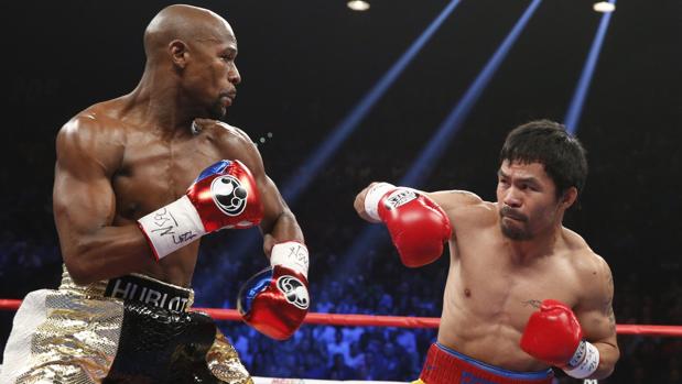 Mayweather contra Pacquiao en su última pelea en mayo de 2015