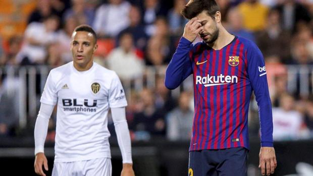 Gerard Piqué y Rodrigo Moreno en el partido liguero