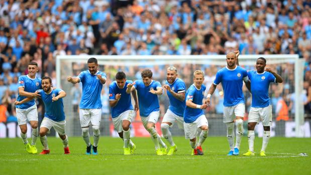 Los jugadores del City celebran el triunfo