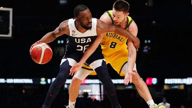 Walker y Dellavedova, en una acción del partido