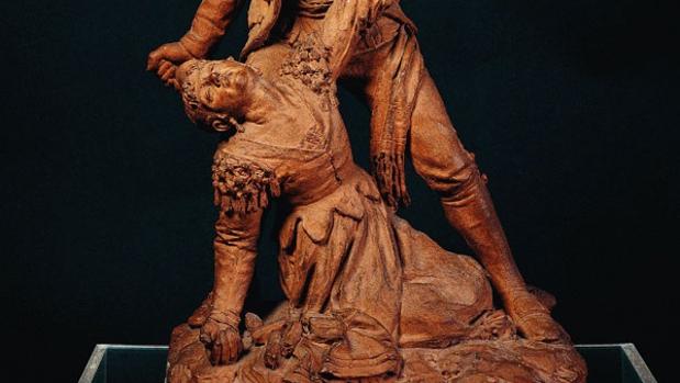 Manuela Malasaña a los pies de su padre el Dos de Mayo de 1808, obra del escultor Antonio Moltó y Lluch