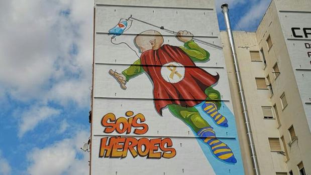 Mural en la fachada de edificio frente a La Fe