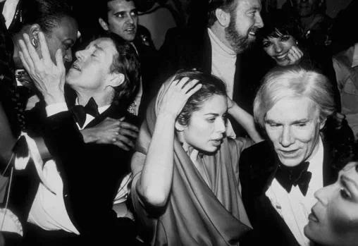 Halston with friends on New Years Eve and New Years at Studio 54 nightclub.