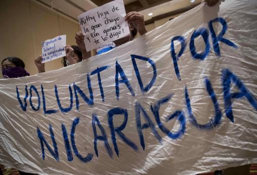 Young people protest in demand for unity of the political forces during a press conference this week in Managua