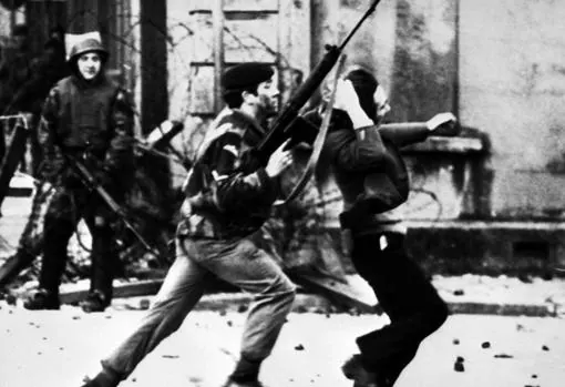 A British soldier violently drags a protester on January 30, 1972